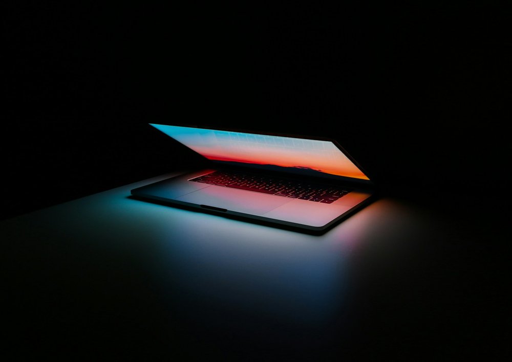 Screen showing macOS and Windows side by side with their user interfaces