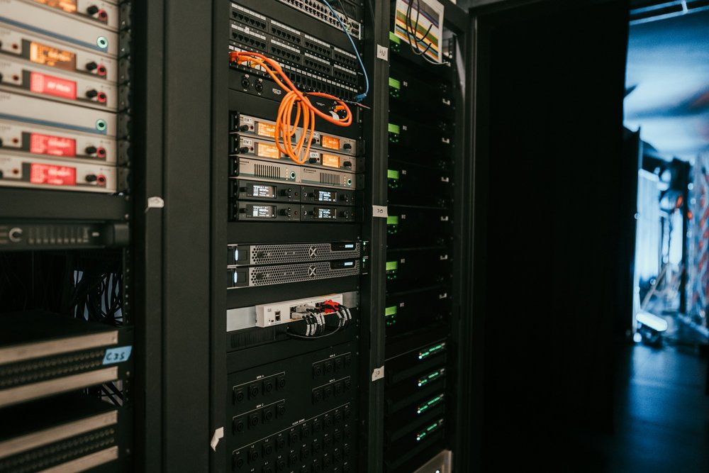 Server room with rows of servers representing cloud storage and data centres