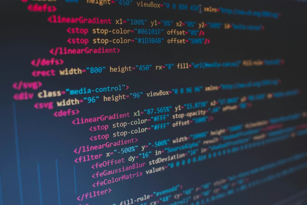 Developer writing code on screen with software architecture diagram in the background